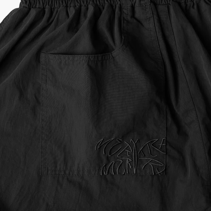 Adjustable waist and ankle toggle pants by Mertra in black
